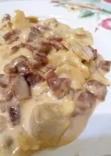 Ricetta Cappelletti in crema di parmigiano e prosciutto crudo