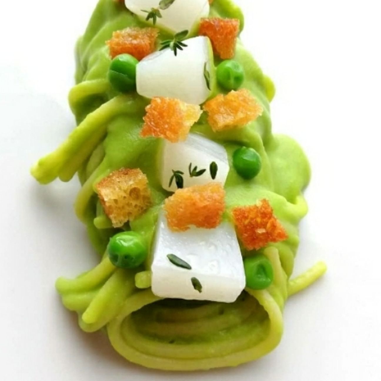 Spaghetti seppie e piselli