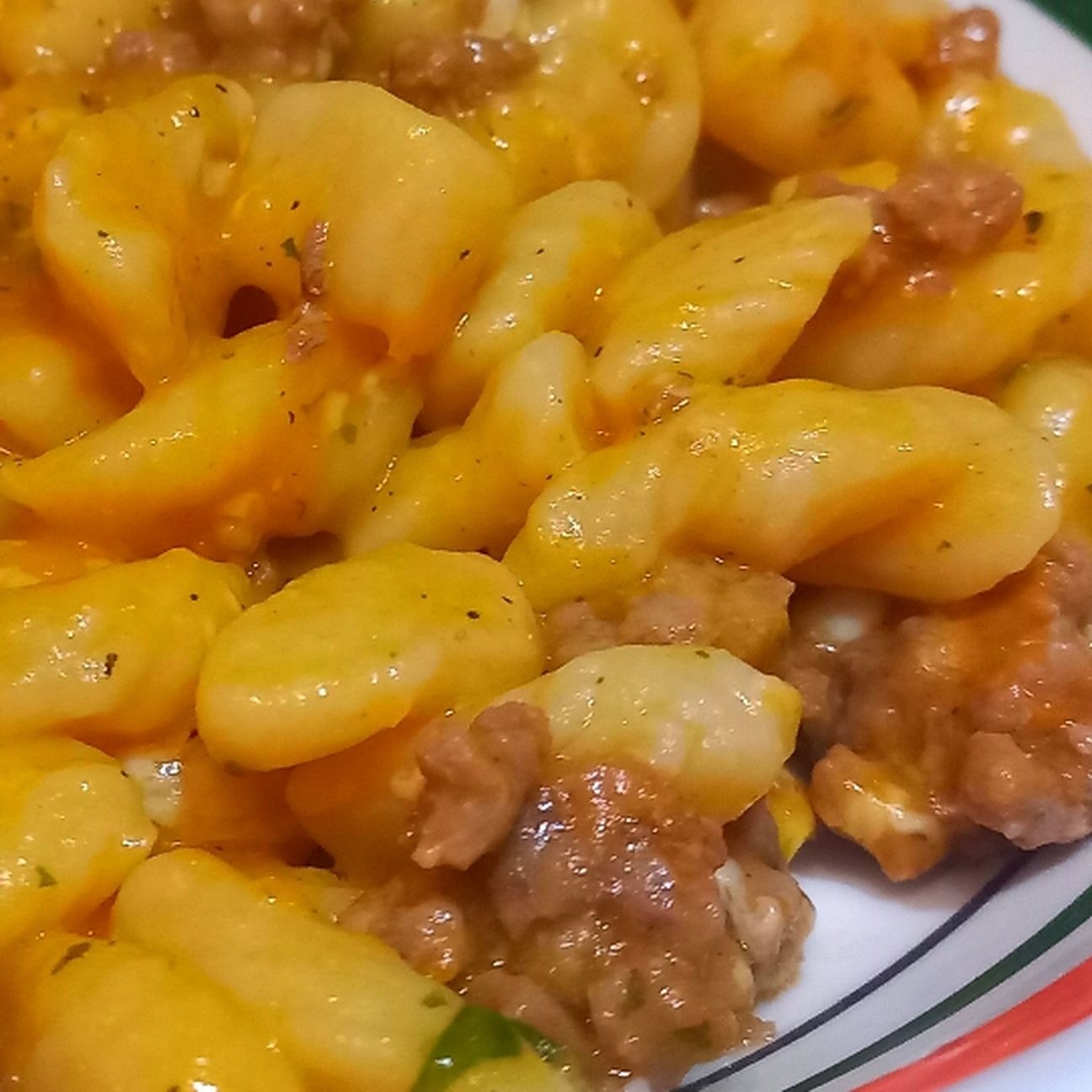 Gnocchi di patate con ragù di maiale e crema si zucca