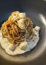 Ricetta Spaghetti di farro, pera, feta, bottarga e limone