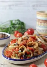 Ricetta Calamari gratinati con pomodorini e olive