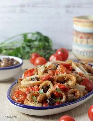 Ricetta Calamari gratinati con pomodorini e olive di millegrammi