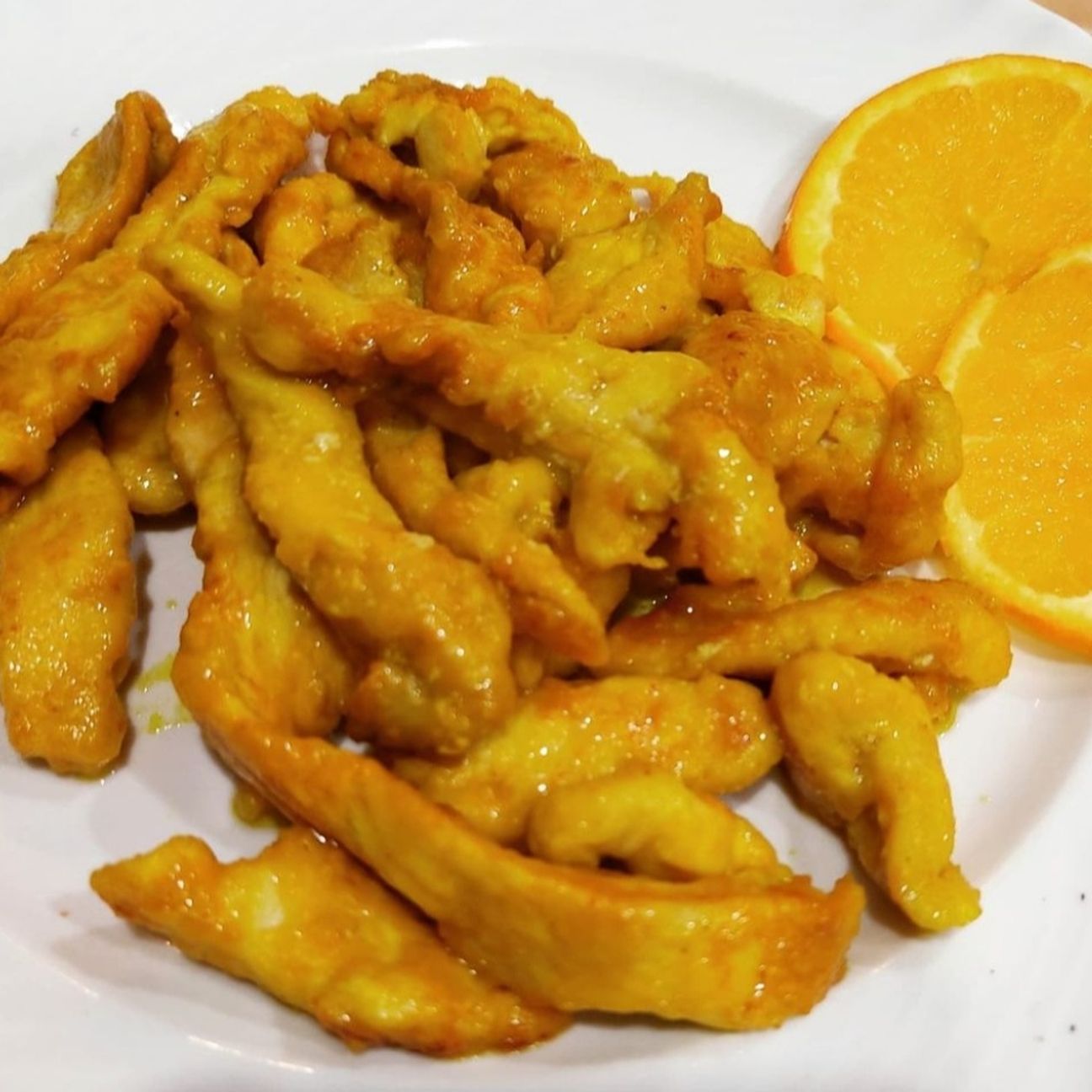 FILETTI DI PETTO DI POLLO ALL'ARANCIA