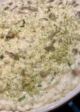 Ricetta Risotto carnaroli ai porcini, burro al tartufo e prezzemolo