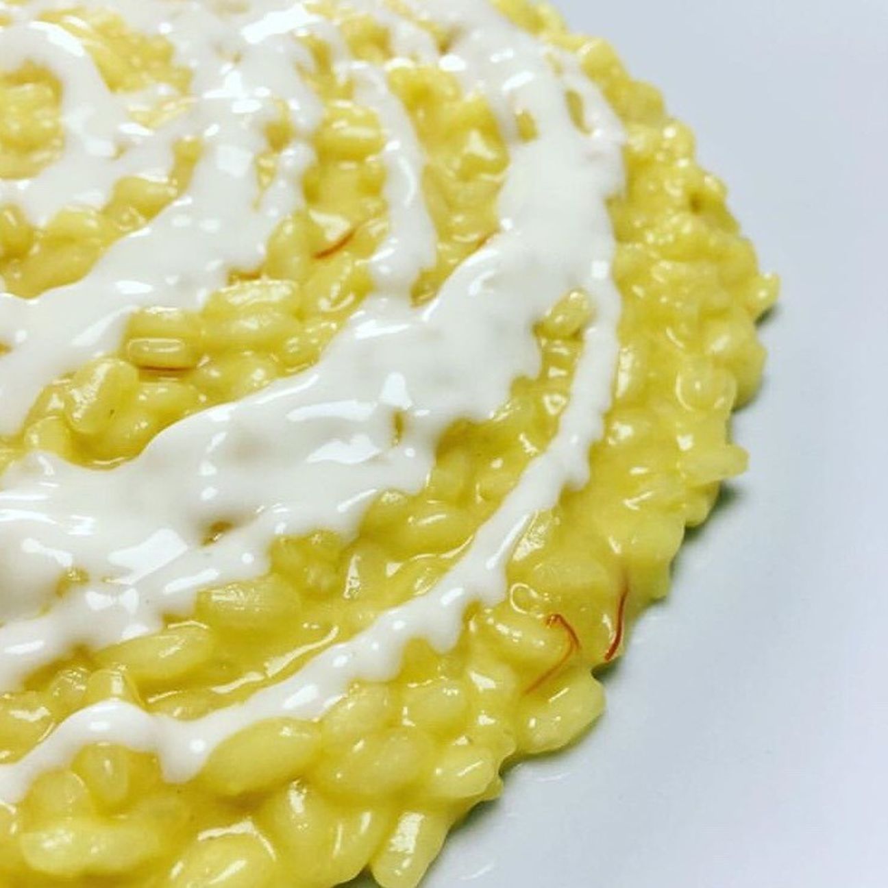 Risotto allo zafferano e fonduta di taleggio