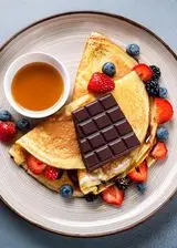 Ricetta Crepès con cioccolato e frutta fresca