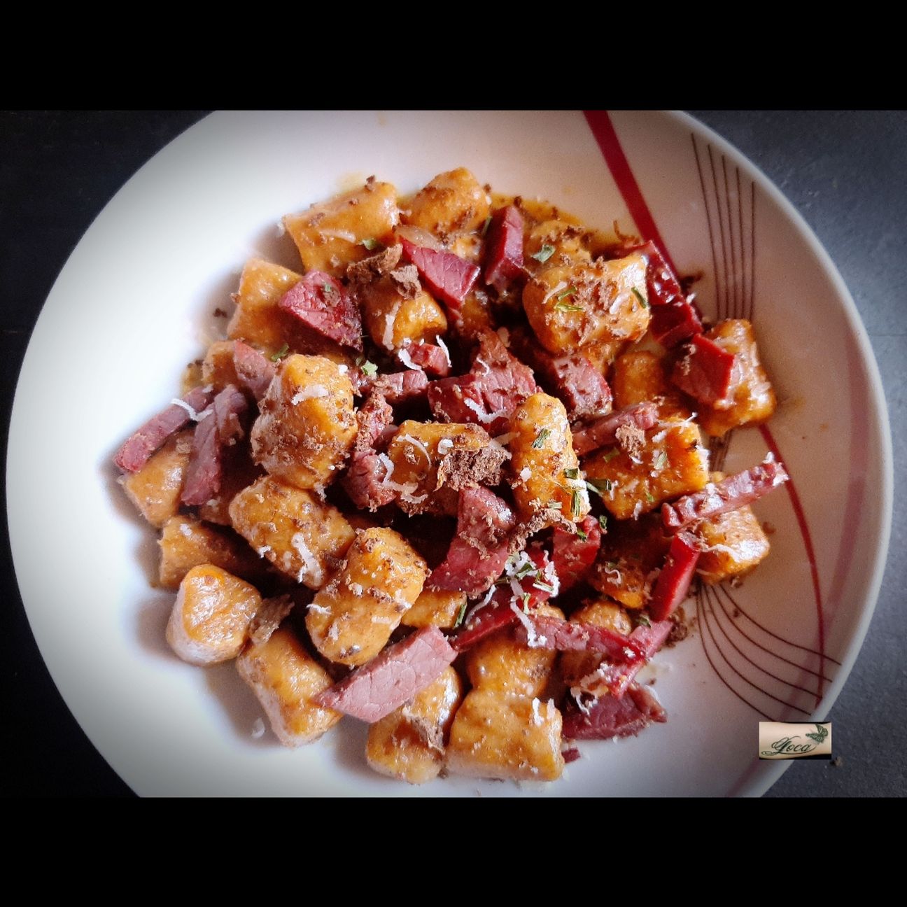 Gnocchi di Carote con Bresaola e Scaglie di Tartufo