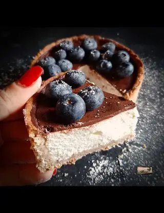 Ricetta Crostata Cheesecake Nocciola, Cioccolato e Mirtilli di Loca