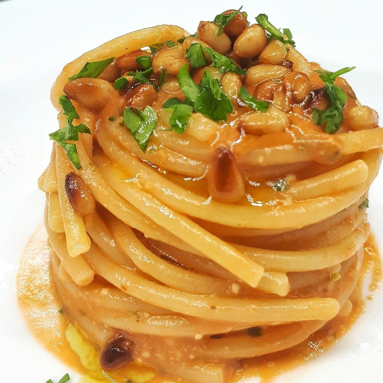 Vermicelli con acciughe e pinoli tostati