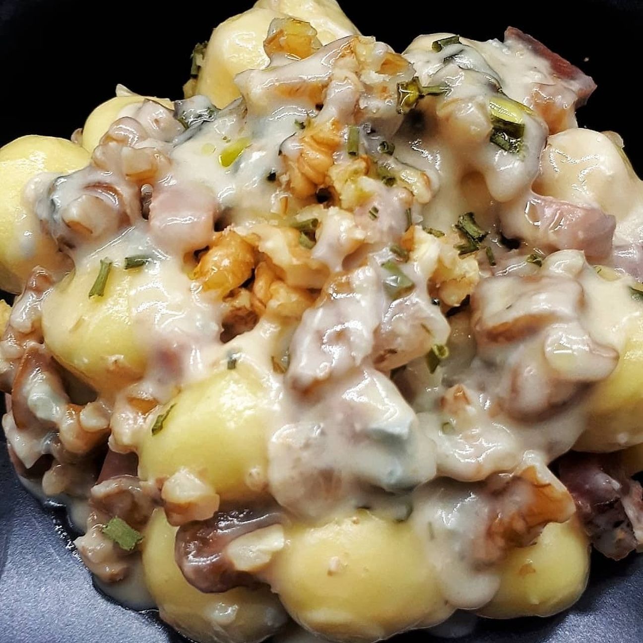 Gnocchi al gorgonzola noci e speck