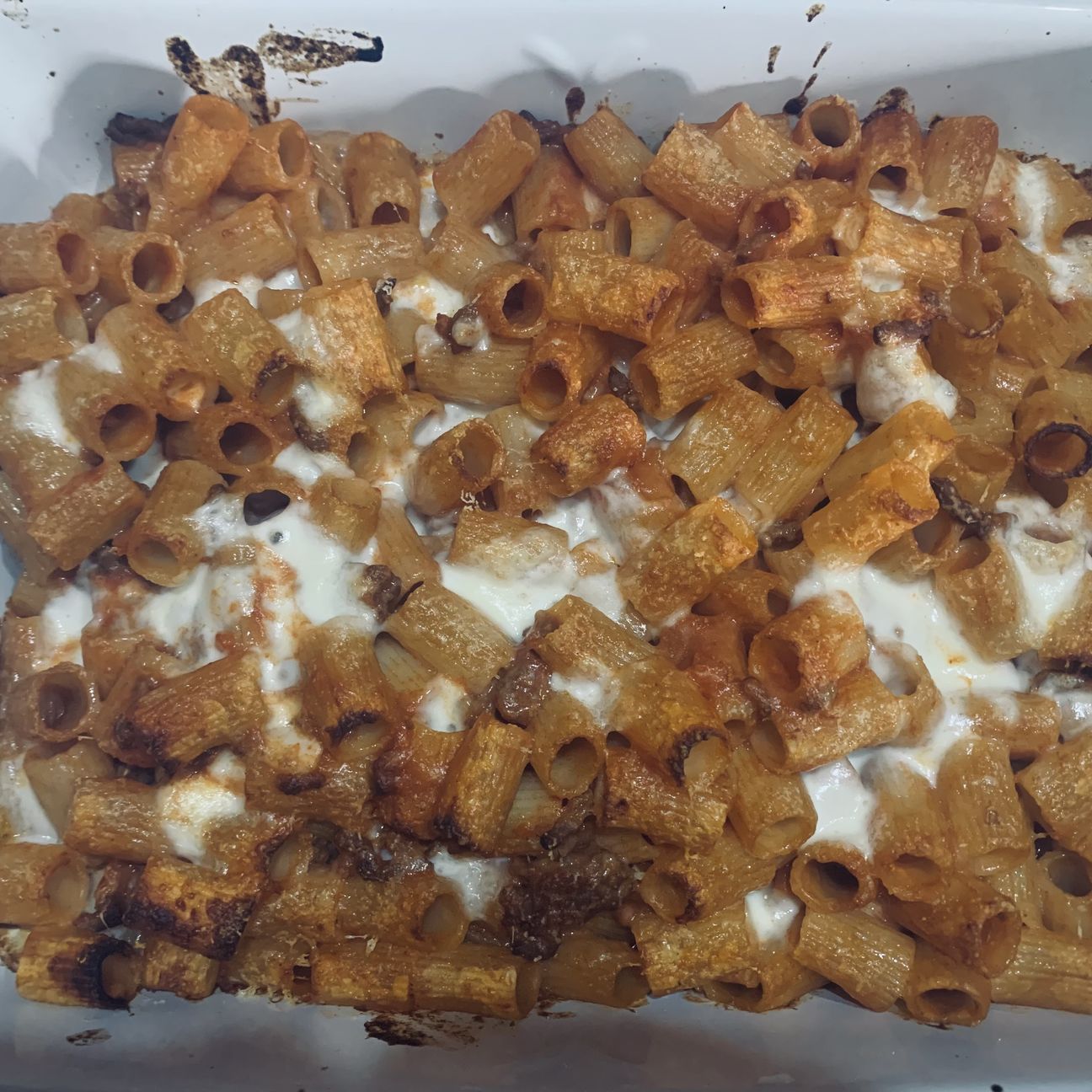 Mezze maniche al ragù al forno