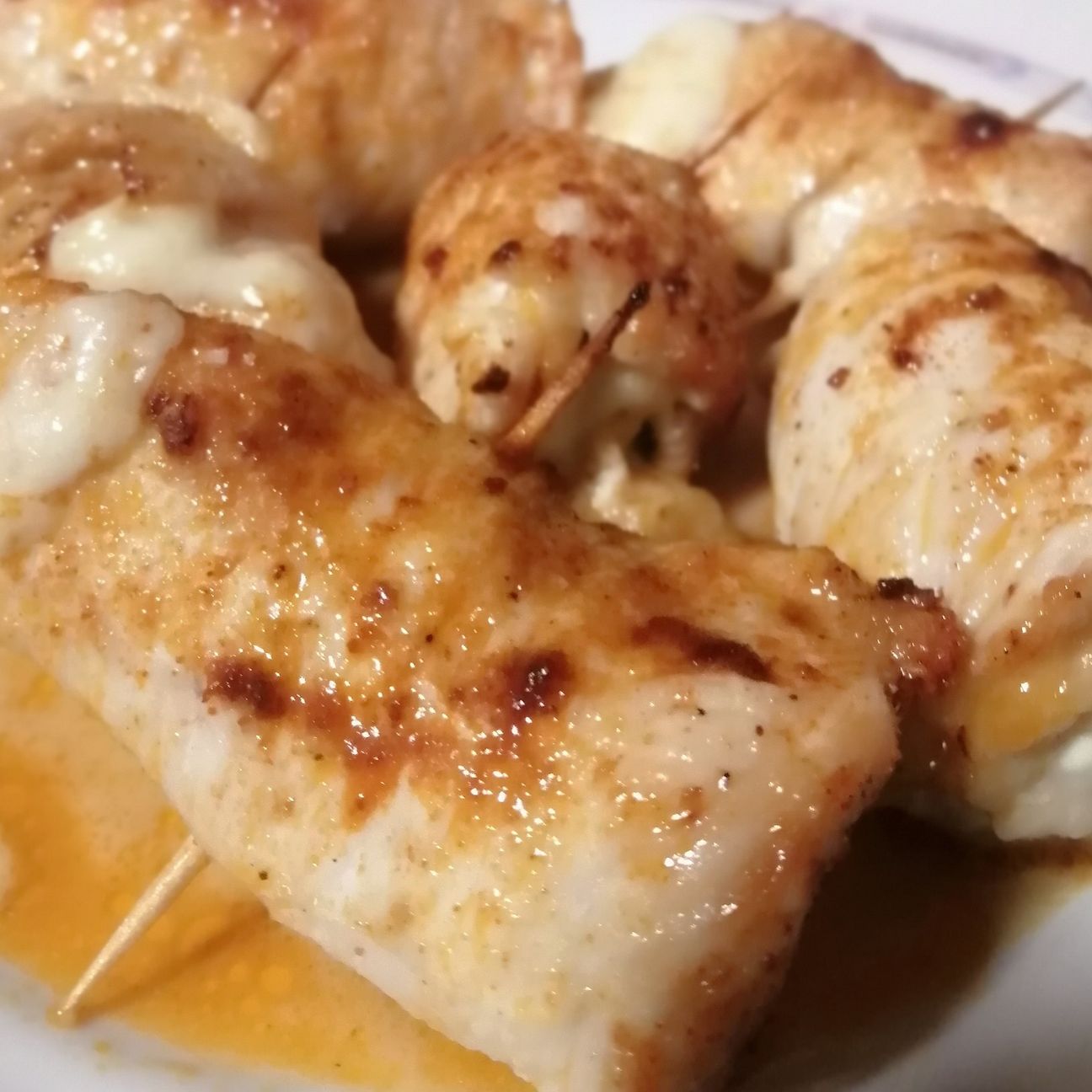 Involtini di tacchino con ripieno di zucchine e tilsit