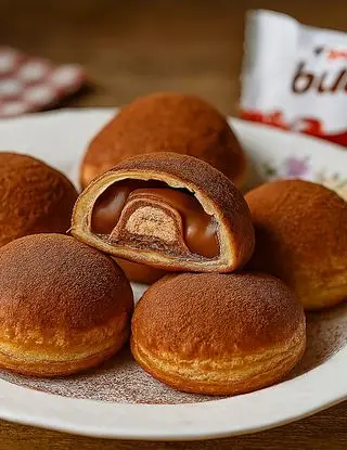 Ricetta Dolcetti di pasta sfoglia con cioccolatini alla nocciola e crema golosa di lastanzadeisapori