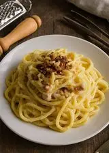 Ricetta Spaghetti dorati con pancetta e ricotta