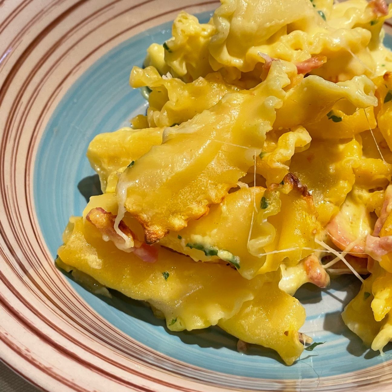 Pasta al forno con speck e scamorza