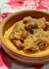 Ricetta Polenta con cipolle e salsiccia in umido