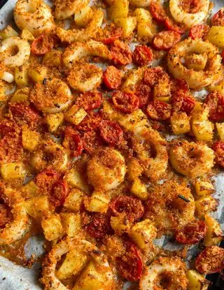 Ricetta Calamari gratinati croccanti con patate e pomodorini di ilmiopiattoacolori