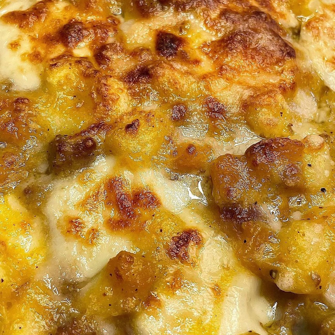 Gnocchi gratinati con zucca, salsiccia e scamorza