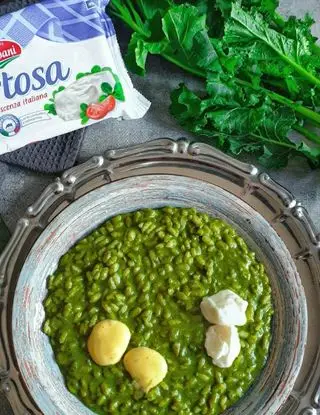 Ricetta Risotto con cime di rapa, mantecato con Certosa e gocce di maionese di cachi di Bina
