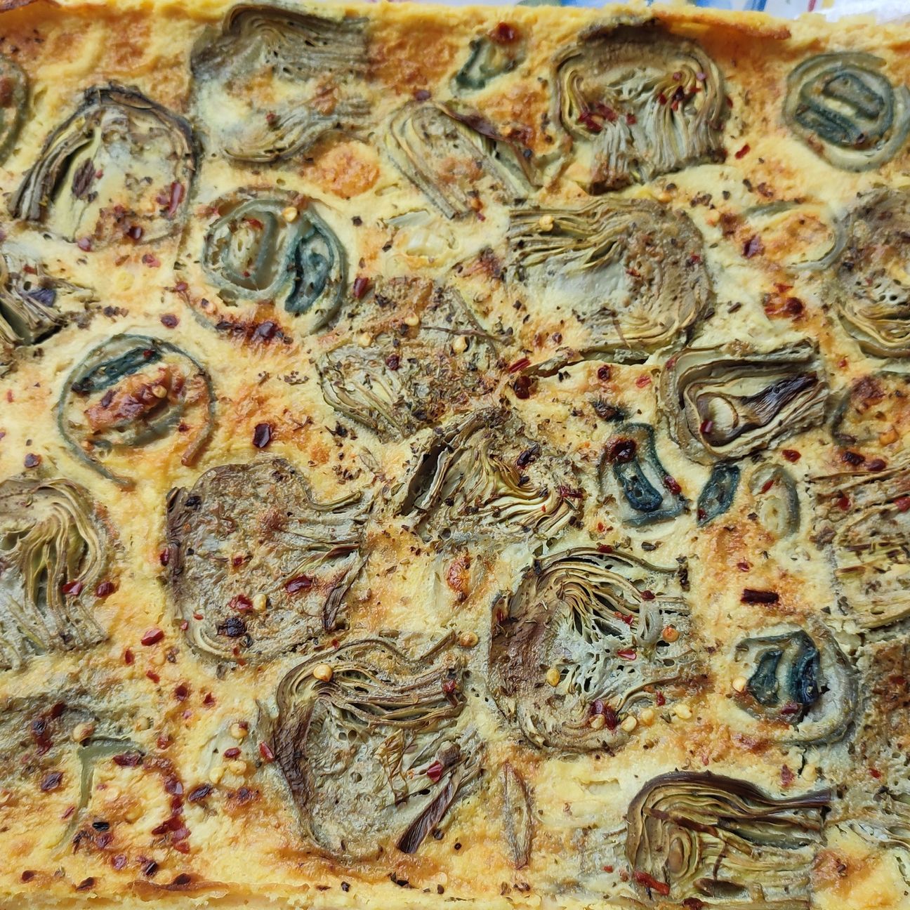 Farinata di ceci con carciofi e cipolle