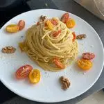 Ricetta Spaghetti con pomodorini datteri e noci