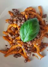 Ricetta Maccheroni al ferro con crema di peperoni e salsiccia sbriciolata