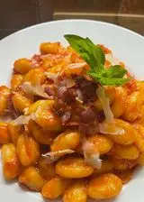 Ricetta Gnocco pomodorini frullati e speck