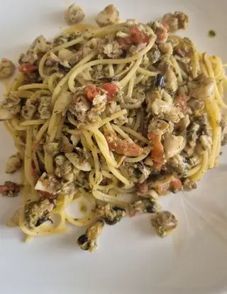 Ricetta Spaghetti gluten free con Vongole, Cozze e pesce sfumati al Cognac e Pomodorini di marchichef