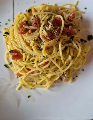 Ricetta Spaghetti gluten free con la polpa di Granchio,  Limone e pomodorini. di marchichef