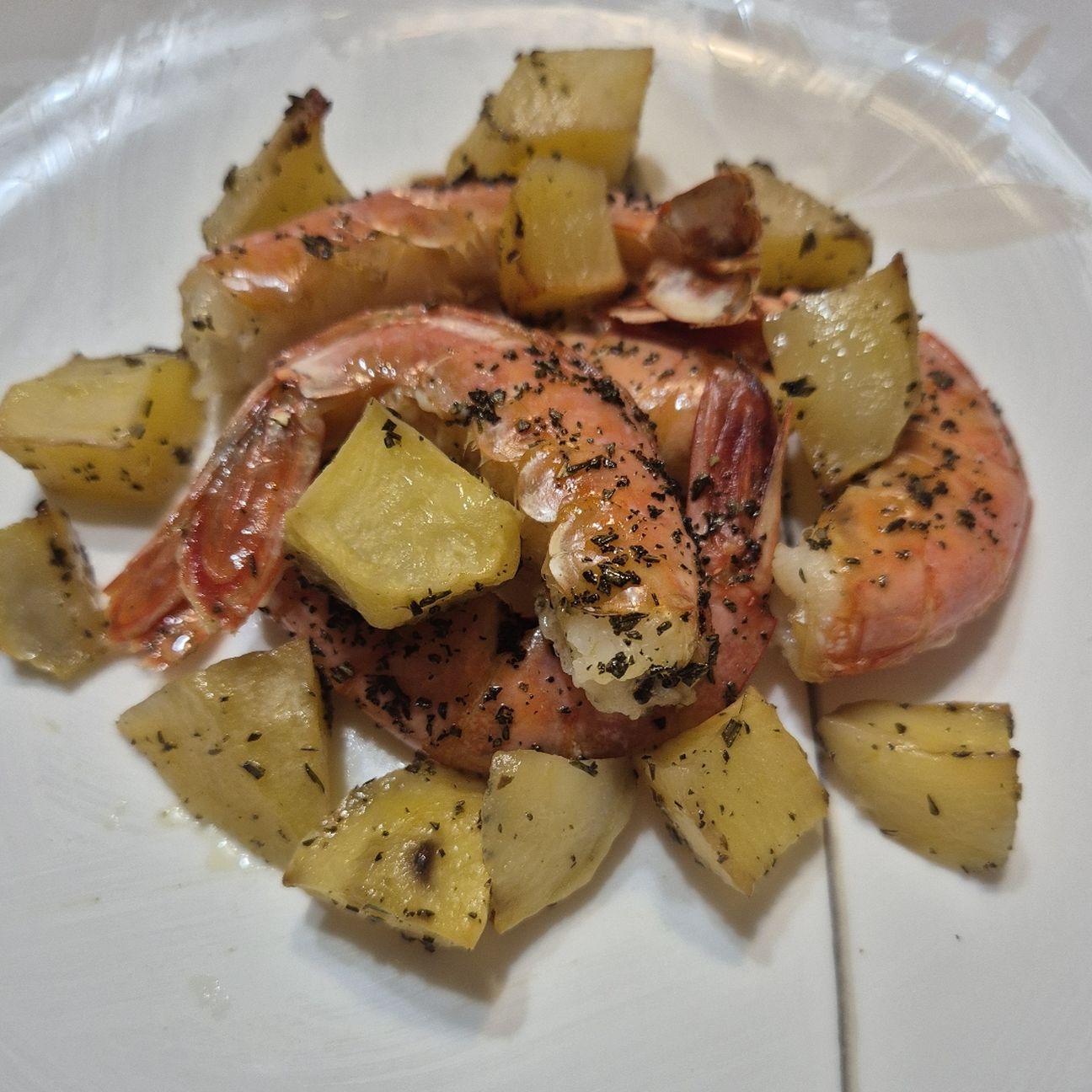 Gamberoni al forno con contorno di patate