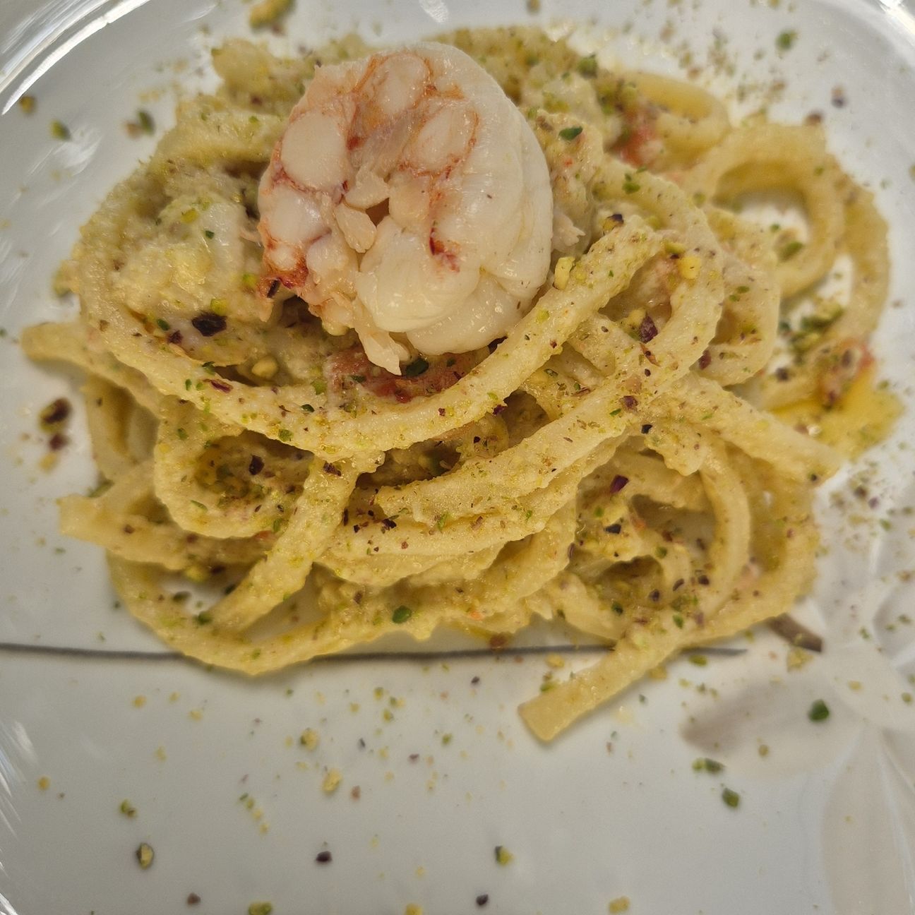 Pici gluten free con pesto di gamberi, limone e pistacchio