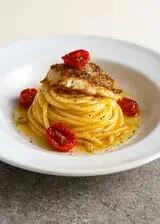 Ricetta Spaghetti all'orata e pomodorini confit