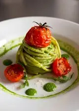 Ricetta Spaghettone al pesto di rucola e pomodorini confit