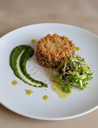 Ricetta Medaglione di melanzana gratinato e scarola all'acciuga di osteriadalele