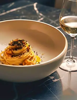 Ricetta Spaghetti alla polpa di riccio, polvere di limone bruciato e pepe di osteriadalele