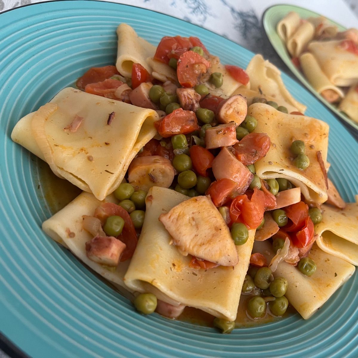 Paccheri con totani e piselli