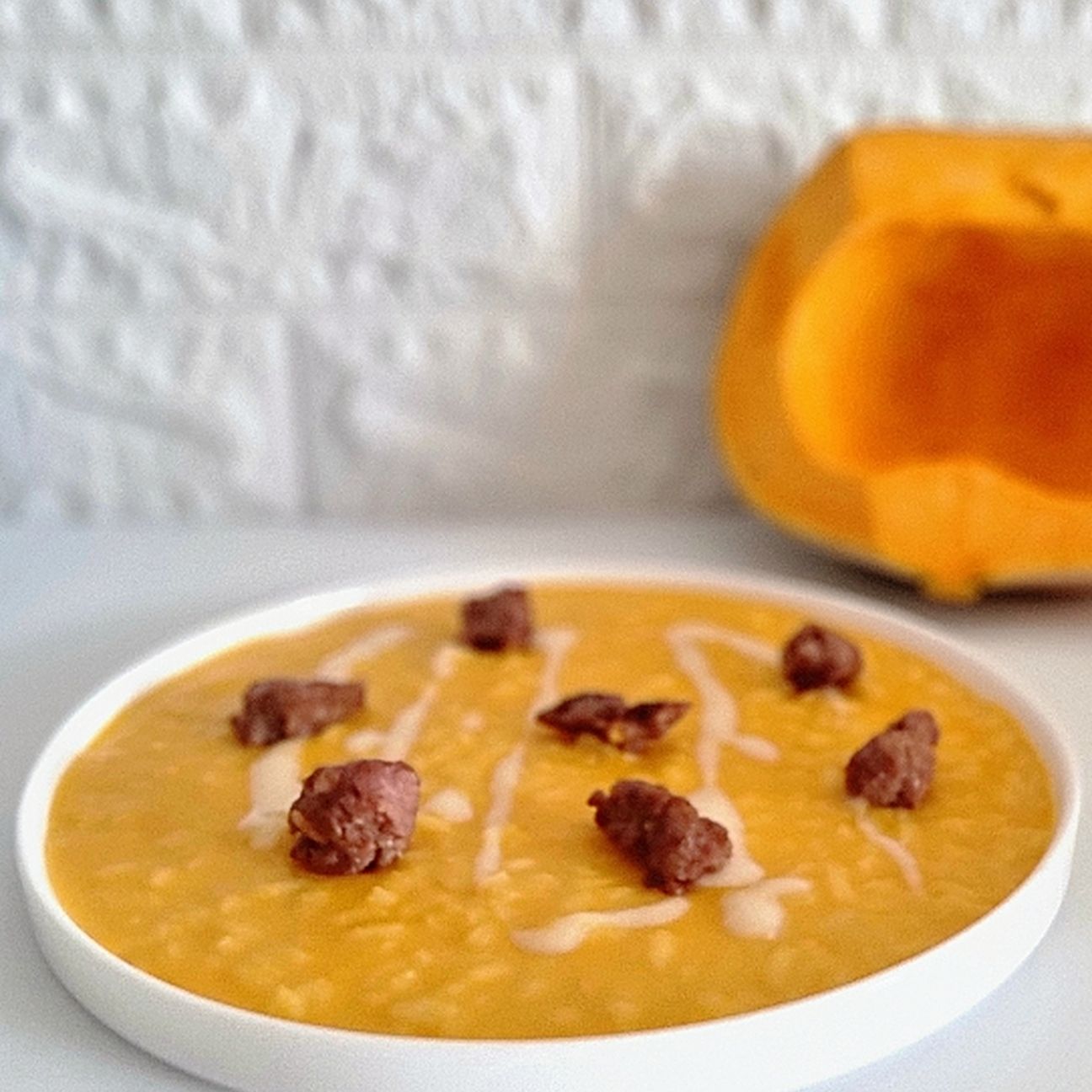 Risotto alla zucca, salsiccia e taleggio