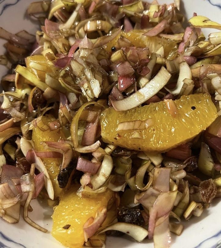 Insalata di carciofi con pinoli tostati,arance tagliate a vivo e uva sultanina