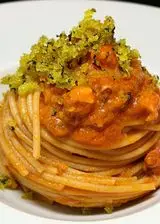 Ricetta Spaghetti integrali con ragù di polpo e pane aromatizzato al finocchietto