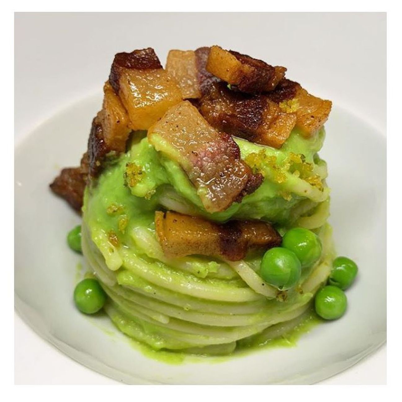 Chitarra con crema di piselli e guanciale