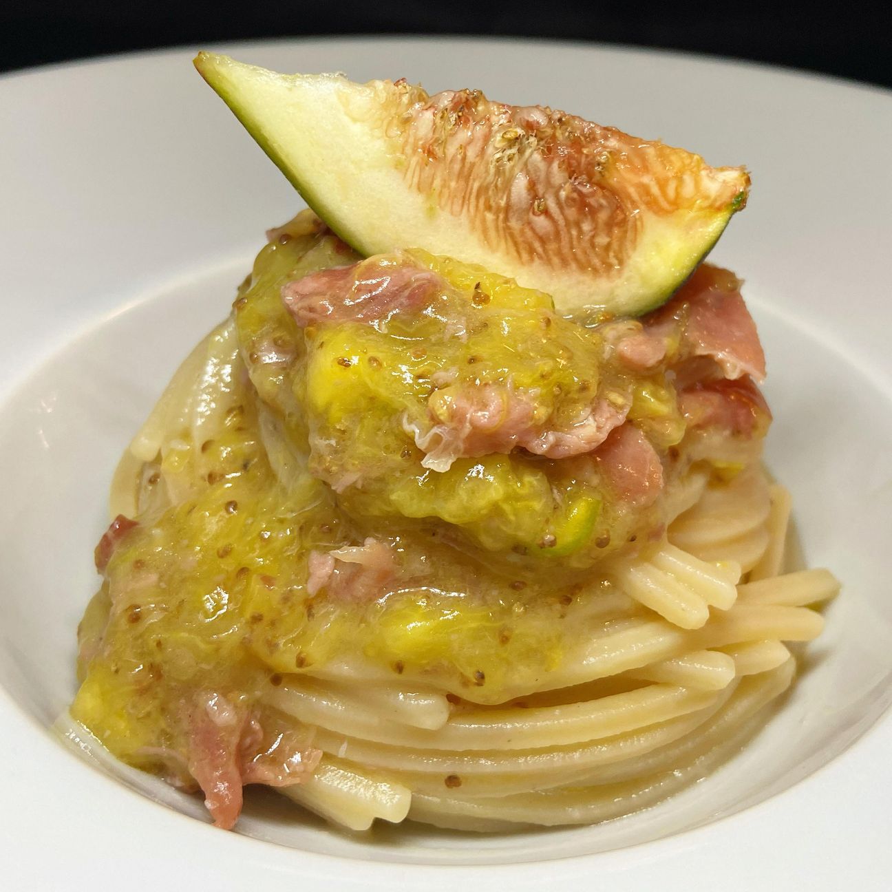 Chitarra con fichi e speck