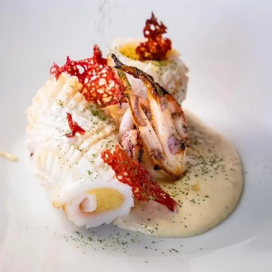 Ricetta Calamaro ripieno di patate e cime di rapa, crema di topinambur e cialda di corallo di Chef.Giuseppe