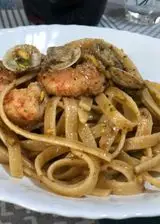 Ricetta Fettuccine ai gamberi e vongole con pistacchio