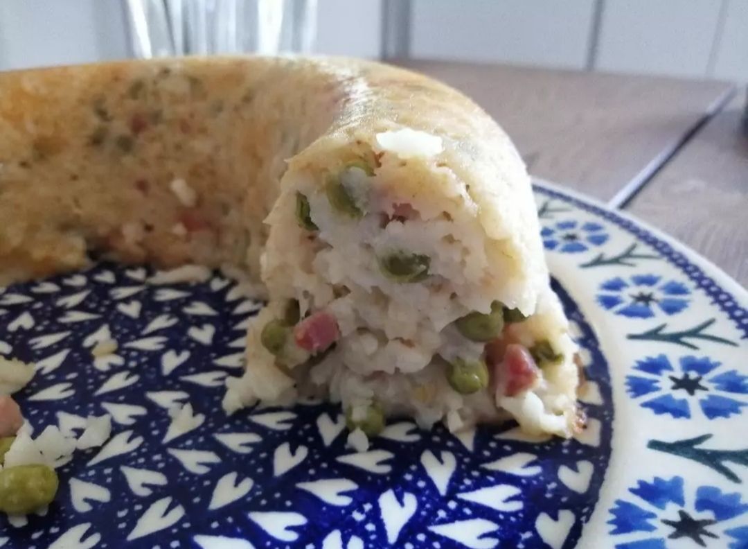 Timballo di riso e piselli.