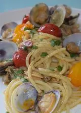 Ricetta Spaghetti alle vongole e pomodorini