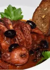 Ricetta Moscardini affogati con olive celline e crostini di pane integrale ai cereali