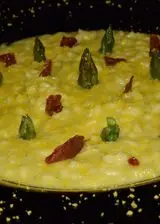 Ricetta Risotto alla crema di asparagi con tuorlo marinato e speck croccante