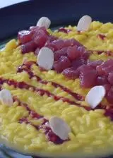 Ricetta Risotto allo zafferano, tonno e salsa alla melagrana.