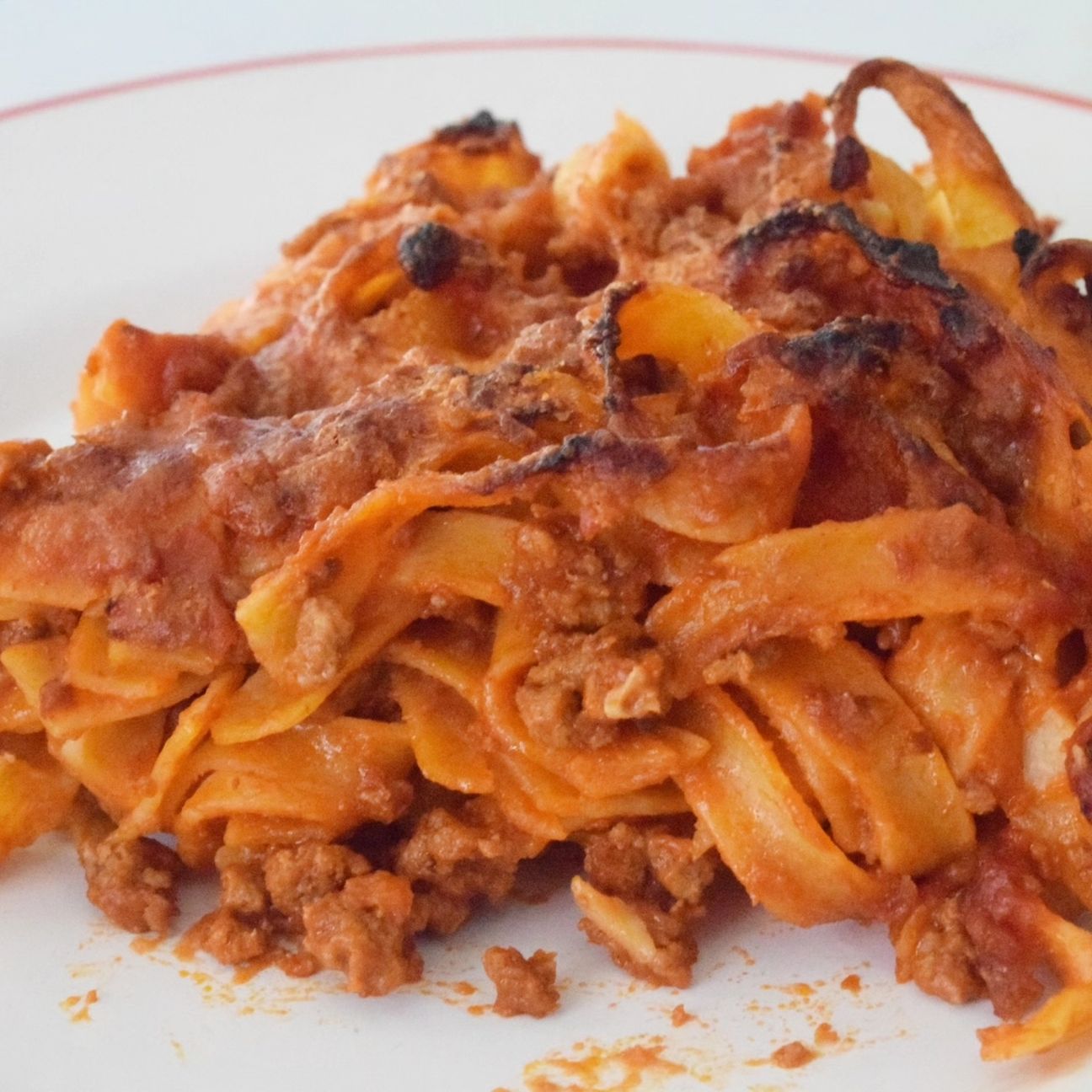 Tagliatelle al forno con ragù.