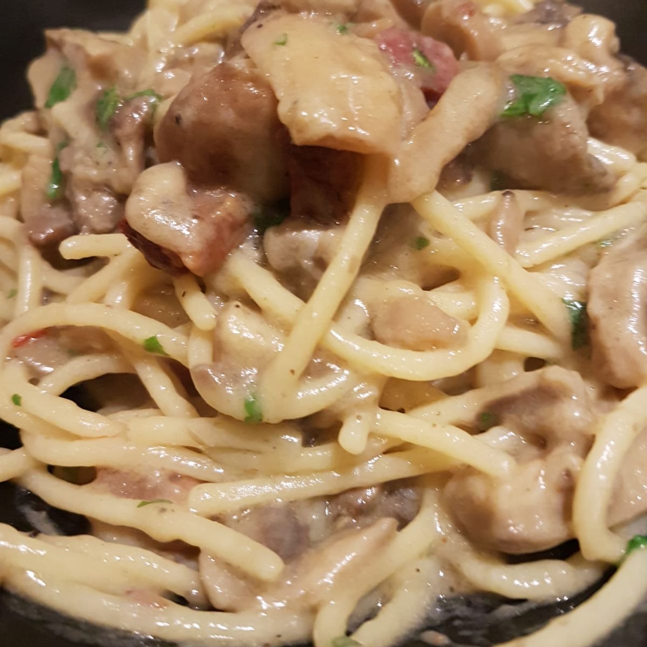 Spaghetti con porcini e salsiccia